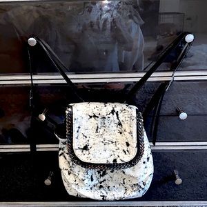 Stella McCartney backpack in black, grey and white w plenty of room! It’s a 💎